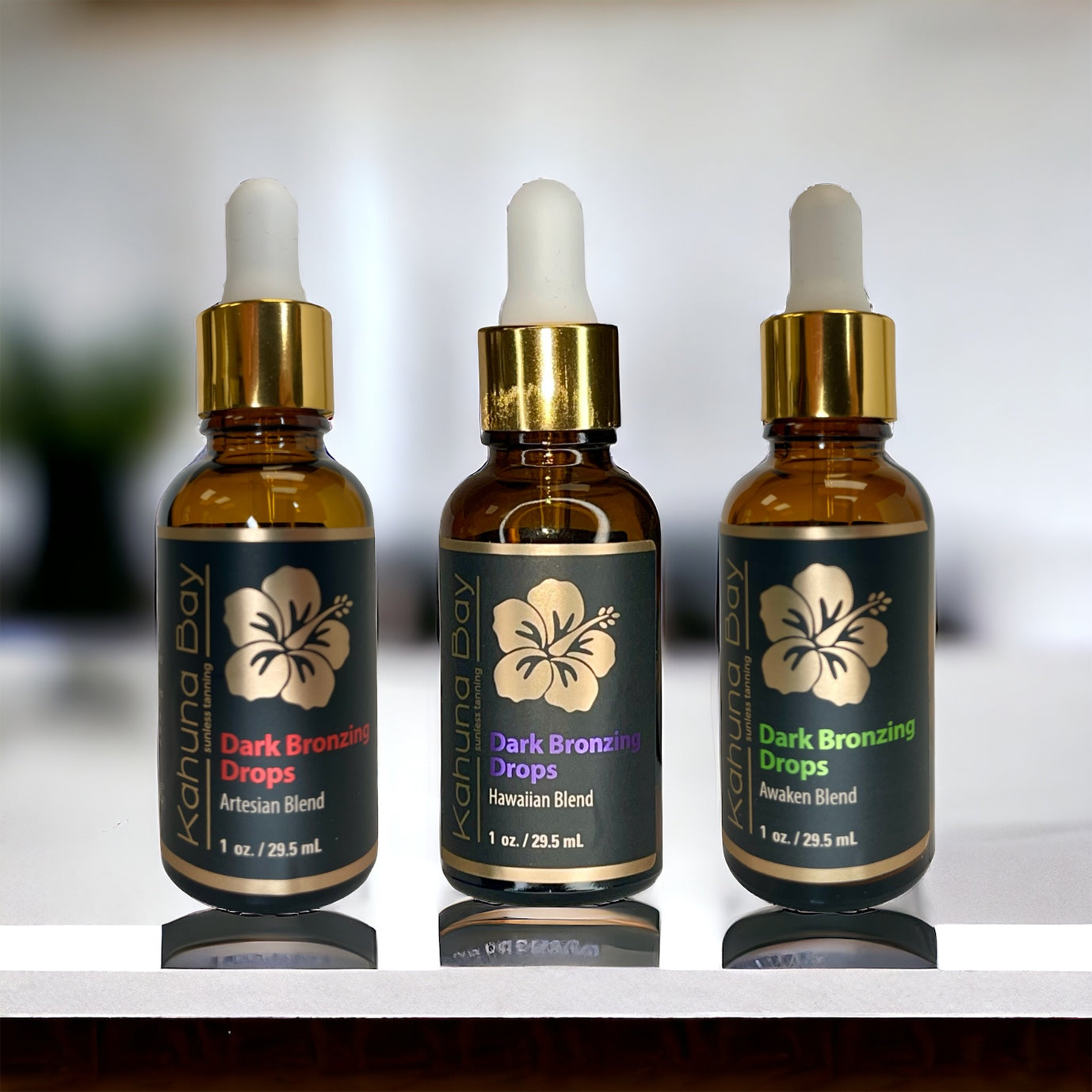 3 bottles of bronzing drops on counter