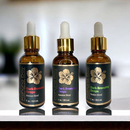 3 bottles of bronzing drops on counter