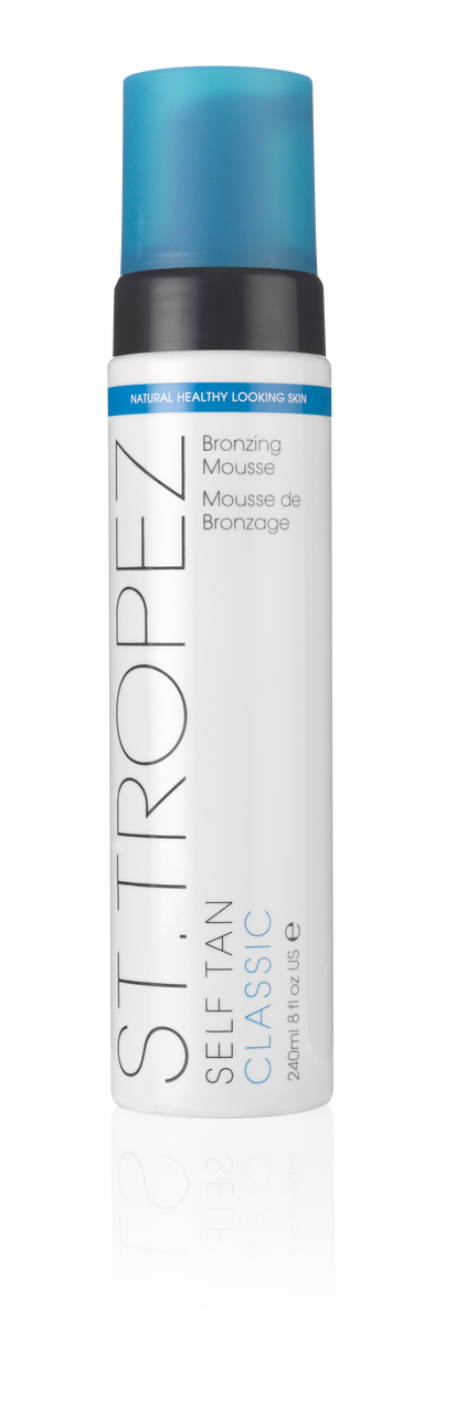 alt= Image of a white bottle with a blue cap labeled "St. Tropez Self Tan Classic Bronzing Mousse, 240ml." The words "Natural Healthy Looking Skin" appear at the top